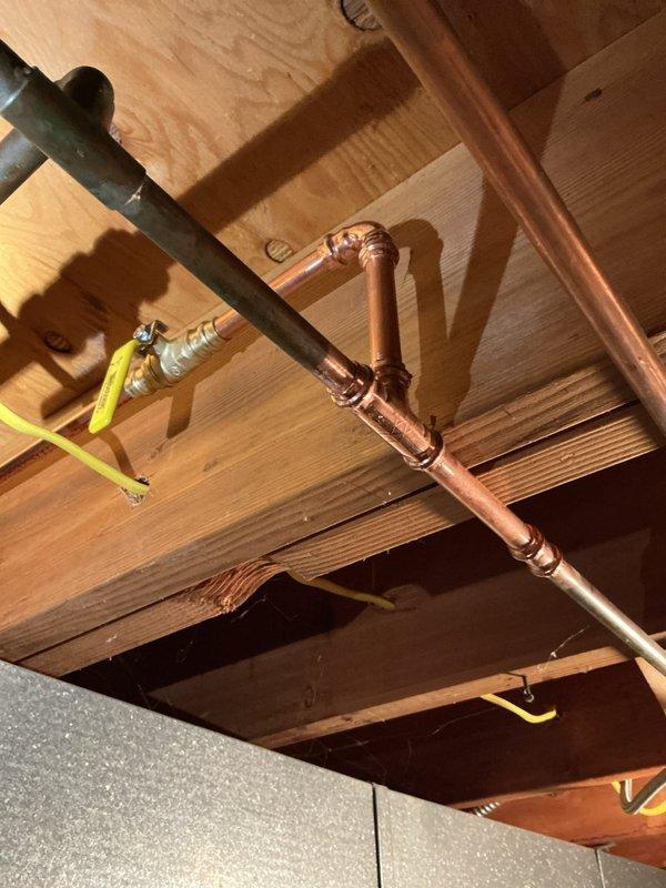 Replaced both exterior hose spigots with frost-free units to bring the installation up to current plumbing code. Removed existing gate valves and installed new quarter-turn ball valves for improved shutoff reliability. Ran new copper supply lines from the ball valves to the frost-free spigots, utilizing proper soldering techniques at all joints and connections. Secured both spigot assemblies to the exterior wall with appropriate mounting hardware and sealed all penetrations through the siding to prevent water intrusion and air leakage.