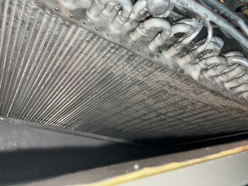 Performed preventative maintenance on indoor air handling unit including evaporator coil cleaning to remove accumulated dust and debris. Installed drain line treatment tablets to prevent algae buildup and maintain proper condensate drainage, and added surge protection device to safeguard system components from electrical damage.