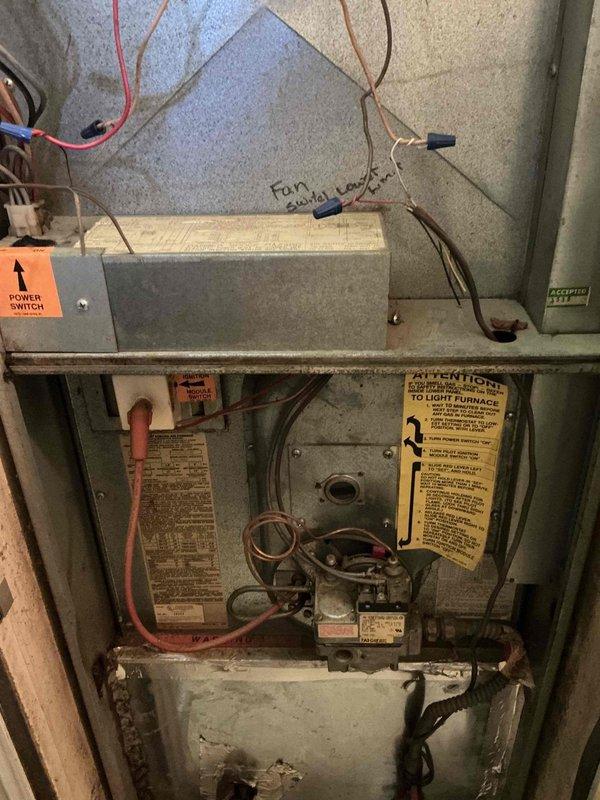 Completed HVAC system replacement estimate for a mobile home with a 30-year-old furnace unit showing significant age and wear. The existing system, housed in a confined mechanical closet with deteriorated ductwork and accumulated dust throughout all components, was assessed for full replacement due to obsolescence and safety concerns related to aged gas valve assembly, worn electrical connections, and compromised ventilation infrastructure.