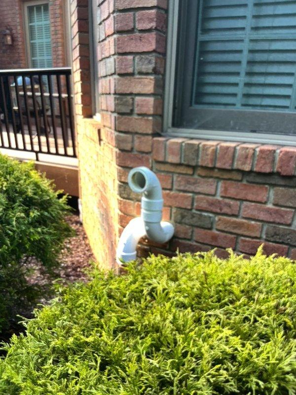 Return visit to diagnose ongoing issues with recently installed tankless water heater system. Initial assessment suspected gas pressure regulator at meter, but utility company confirmed regulator was functioning properly. Continued diagnostic procedures to identify root cause of performance issues. Inspected PVC venting system extending from exterior brick wall, including intake and exhaust terminations. Further troubleshooting required to isolate problem and determine appropriate corrective action.