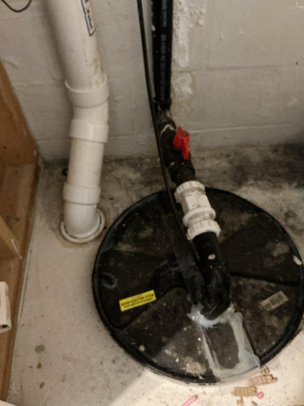 Responded to service call for non-functional sump pump producing grinding noise. Upon inspection, found sump pump basin with integrated radon reduction system requiring special handling. Carefully removed and documented sealed cover connected to radon mitigation piping to access failed pump unit. Assessed pump condition and determined replacement necessary due to mechanical failure. Provided comprehensive quote for sump pump replacement, ensuring new installation will maintain proper integration with existing radon system and require professional resealing of basin cover upon completion to preserve radon mitigation effectiveness.