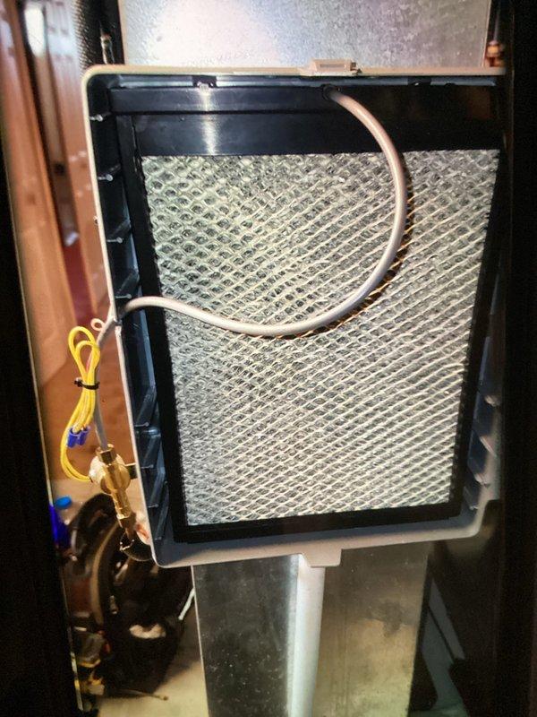 Completed comprehensive AC tune-up including system inspection and performance evaluation. Inspected evaporator coil assembly, blower wheel mechanism, and heat exchanger components for proper operation. Verified air filter condition and examined refrigerant lines, electrical connections, and ductwork connections throughout the air handler unit.