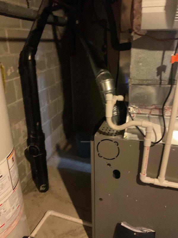 Completed scheduled MVP cooling maintenance visit on 15-year-old residential HVAC system. Performed comprehensive inspection of furnace unit, condensate drainage system including PVC piping and trap assembly, ductwork connections, and associated mechanical components in basement utility room. System found operating within normal parameters; verified proper condensate flow, inspected electrical connections, and confirmed all safety mechanisms functioning correctly.