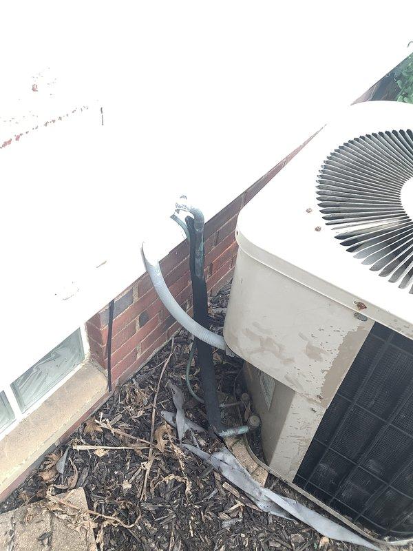 Completed furnace and air conditioning replacement estimate for residential property. Evaluated existing outdoor condenser unit positioned against brick exterior, noting weathered condition and accumulated debris in nearby gutter system. Applied applicable senior and military discounts to estimate pricing.