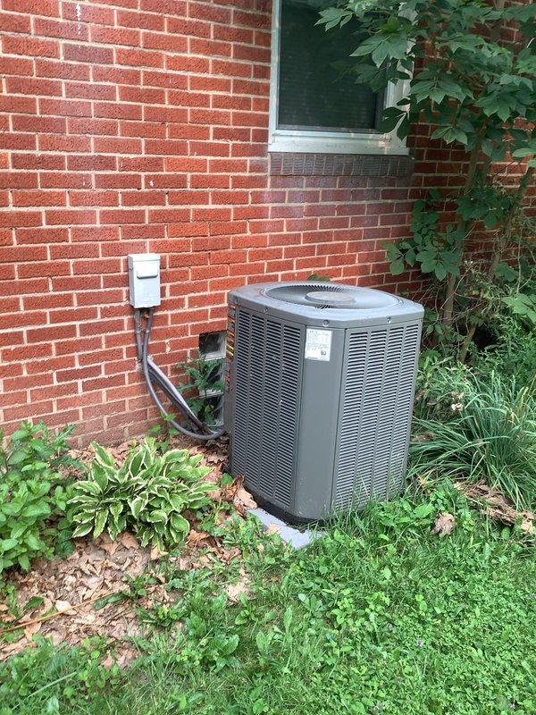 Responded to service call for 10-year-old air conditioning system with reported ice accumulation and frozen condition. Upon arrival, inspected outdoor condensing unit and identified restricted airflow as primary cause of freezing. Removed and examined cylindrical pleated air filter, which showed significant dust accumulation and debris buildup causing reduced system airflow. Replaced dirty filter with new unit to restore proper air circulation. Allowed system time to thaw completely before restarting. Verified proper refrigerant pressures, checked electrical connections at disconnect box, and confirmed condenser fan operation. System returned to normal cooling operation with no ice formation. Advised proper filter maintenance schedule to prevent future freezing issues.