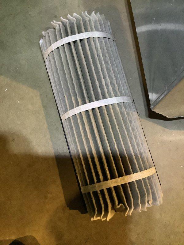 Responded to service call for 10-year-old air conditioning system with reported ice accumulation and frozen condition. Upon arrival, inspected outdoor condensing unit and identified restricted airflow as primary cause of freezing. Removed and examined cylindrical pleated air filter, which showed significant dust accumulation and debris buildup causing reduced system airflow. Replaced dirty filter with new unit to restore proper air circulation. Allowed system time to thaw completely before restarting. Verified proper refrigerant pressures, checked electrical connections at disconnect box, and confirmed condenser fan operation. System returned to normal cooling operation with no ice formation. Advised proper filter maintenance schedule to prevent future freezing issues.