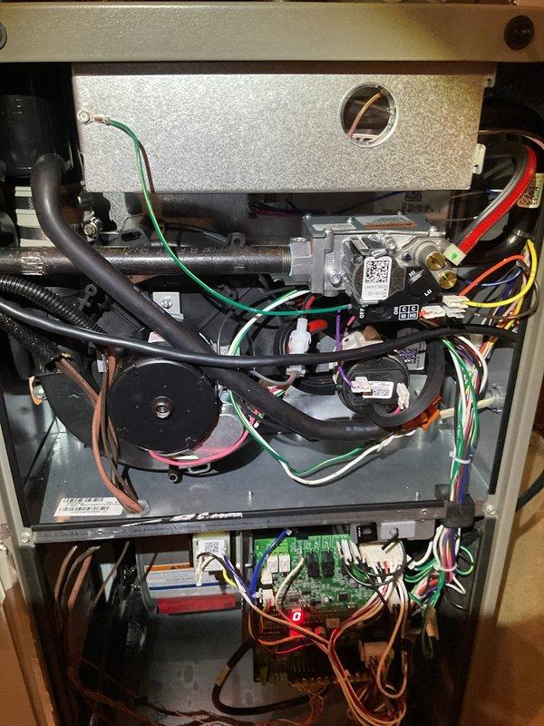 # HVAC Service Completed

Responded to service call for insufficient cooling on second floor. Performed diagnostic evaluation of Lennox air conditioning system. Inspected outdoor condenser unit and indoor air handler components. Examined electrical connections, control board, gas valve assembly, and wiring harnesses within furnace cabinet. Verified proper operation of blower motor and pressure switches. Identified and addressed issue affecting system performance. System restored to proper cooling operation for all zones.