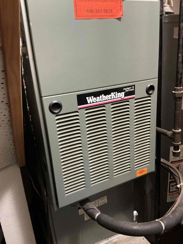 Provided comprehensive estimate for complete HVAC system replacement on 30-year-old air conditioning unit with failed compressor deemed obsolete by home warranty contractor. Assessed existing WeatherKing furnace installation and outdoor condensing unit accessibility in side yard area to determine proper equipment specifications and installation requirements for new system.