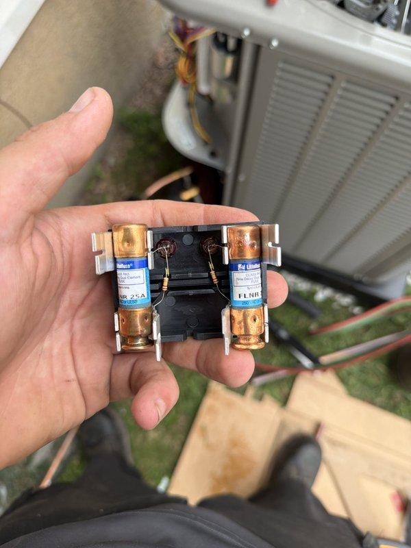 Completed installation of 80% efficiency furnace and air conditioning system. Installed new dual fuse protection with 25-amp fuses in disconnect box, connected refrigerant lines with service valves and filter drier, and verified all electrical connections and copper line sets are properly secured and operational.