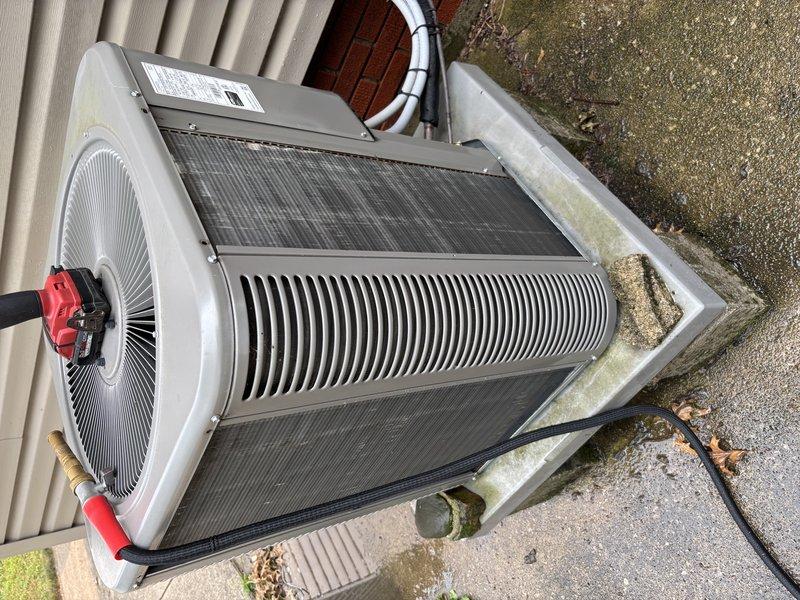 Completed MVP cooling maintenance visit on 6-year-old residential air conditioning system. Performed comprehensive inspection of outdoor condensing unit, including evaluation of condenser coils, fan assembly, and electrical connections. Unit operational with normal wear patterns observed consistent with age and outdoor exposure. Noted minor weathering on concrete pad and presence of organic growth on base perimeter, which is typical for outdoor installations. All critical components functioning within normal parameters at time of service.