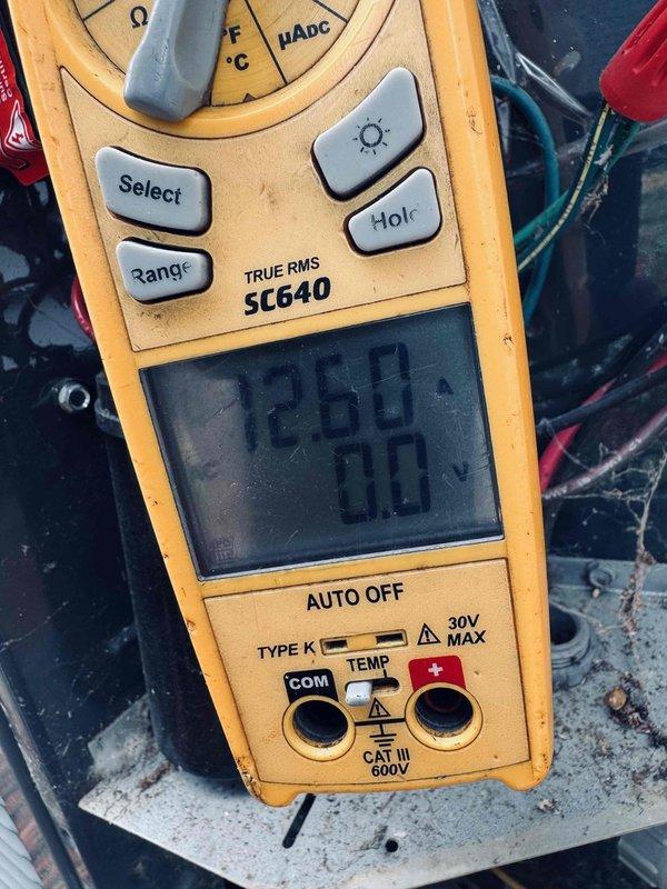 Responded to service call for 11-year-old Trane central air conditioning unit experiencing repeated breaker trips and system shutdowns. Upon arrival, performed diagnostic testing using thermal imaging to identify hot spot measuring 98.2°F at electrical connection point, indicating excessive resistance or loose connection. Utilized digital multimeter to verify electrical readings and confirm abnormal amperage draw of 12.93 amps at affected circuit. Identified failing contactor and compromised wiring as root cause of breaker trips. Repaired electrical connections, replaced defective contactor, and installed new programmable thermostat per customer request. Tested system operation through complete cooling cycle, verified proper amperage draw, and confirmed no further breaker trips. Unit restored to normal operating condition with stable electrical performance.