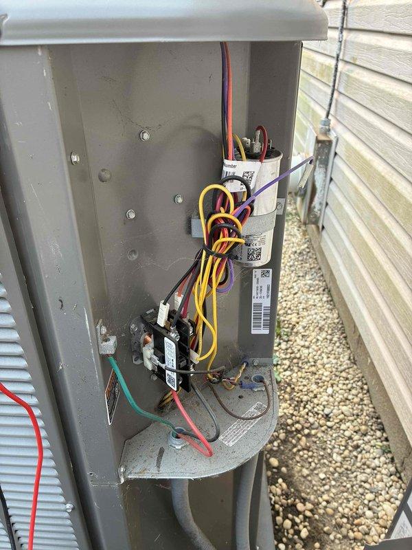 Completed MVP cooling maintenance visit on 4-year-old system. Found condenser coil heavily contaminated with organic debris, cottonwood seeds, and dirt buildup significantly restricting airflow. Cleaned condenser coils, inspected electrical components including contactor and capacitor, verified all wire connections secure, and confirmed unit operational.