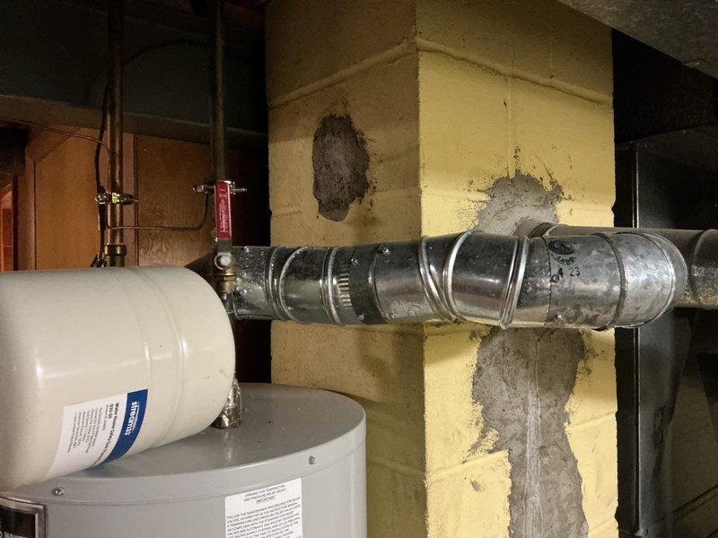 Performed routine maintenance flush on tanked water heater to remove sediment buildup and maintain optimal performance. Unit inspected and confirmed to be in proper working condition with all plumbing connections secure.