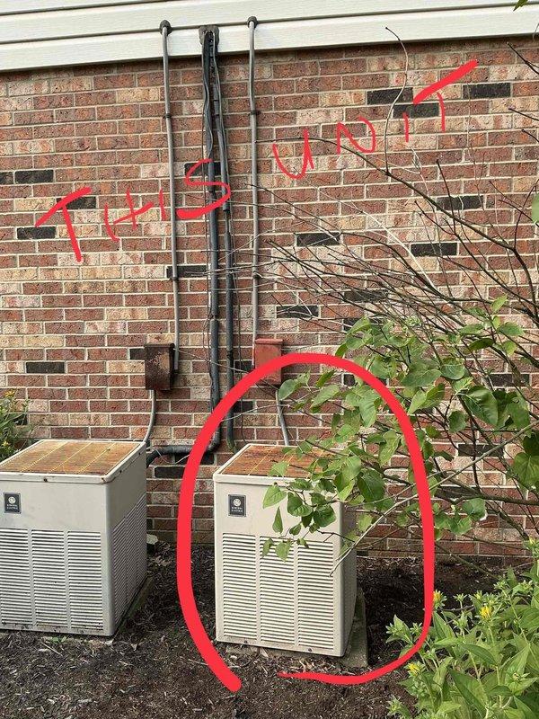 Completed estimate for replacement of 45-year-old air conditioning system. Evaluated existing dual outdoor condensing units positioned on exterior concrete pad against brick building wall, connected via black electrical conduit. Assessed indoor air handler and furnace unit located in basement utility area with existing ductwork and piping infrastructure. Documented current system configuration including galvanized and aluminum ductwork with 90-degree elbows, metal pipe hangers, and ceiling-mounted support structures in unfinished basement space. Provided replacement recommendations for complete HVAC system upgrade.