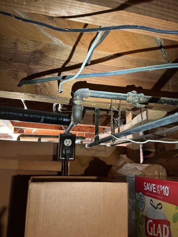 Provided estimate for gas line installation to accommodate dryer conversion from electric to gas. Assessed basement infrastructure and determined routing for gas shut-off valve installation within six feet of appliance location. Identified existing gas supply lines in ceiling joists and confirmed accessibility for connection. Evaluated clearances behind appliance and verified adequate space for code-compliant gas line installation and shut-off valve placement.