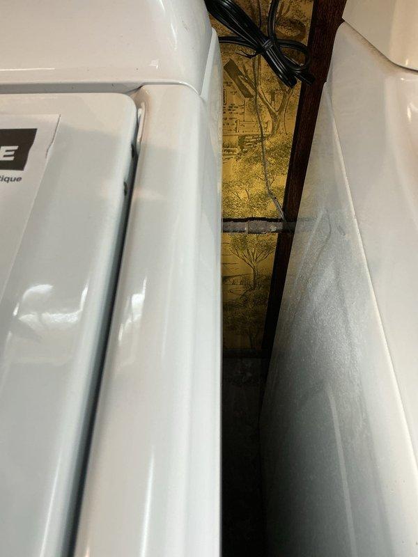 Provided estimate for gas line installation to accommodate dryer conversion from electric to gas. Assessed basement infrastructure and determined routing for gas shut-off valve installation within six feet of appliance location. Identified existing gas supply lines in ceiling joists and confirmed accessibility for connection. Evaluated clearances behind appliance and verified adequate space for code-compliant gas line installation and shut-off valve placement.