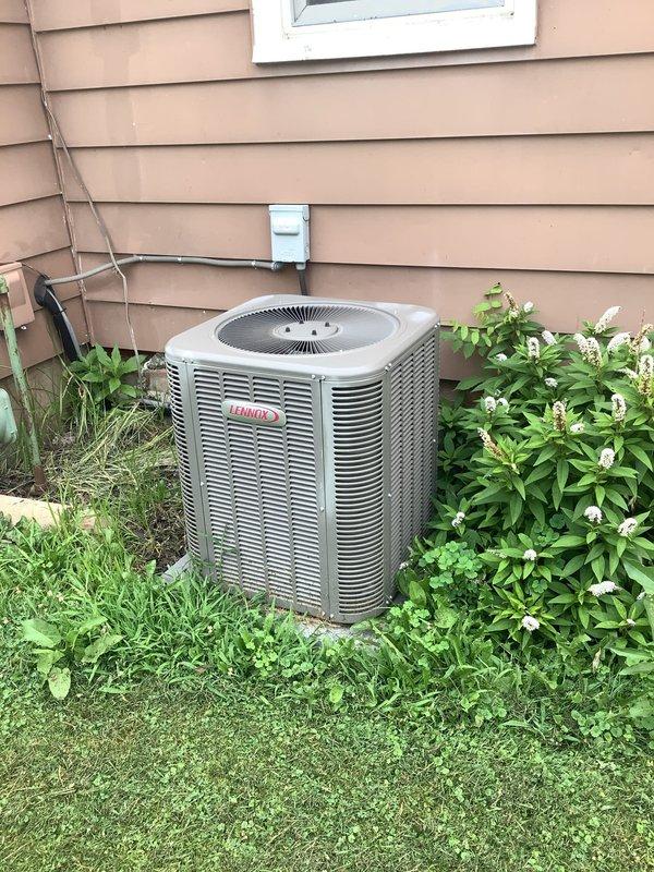 Responded to service call for 6-year-old Lennox AC condenser unit requiring diagnosis and repair. Upon arrival, performed comprehensive system evaluation including visual inspection of outdoor unit, electrical connections, and refrigerant lines. Unit appeared in fair condition with normal weathering for age, proper clearance from surrounding vegetation, and secure mounting on concrete pad. Conducted operational testing, checked refrigerant pressures, inspected compressor function, verified fan motor operation, and assessed electrical components at disconnect box. System components functioning within normal parameters with no immediate failures detected. Documented unit condition with photographs and provided customer with diagnostic findings and recommendations for continued operation.
