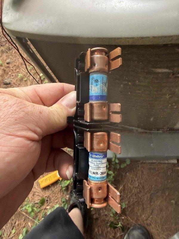 Responded to no cooling complaint on Lennox air conditioning system. Found blown 30-amp FLNR fuses in outdoor disconnect. Replaced defective fuses, restored power to condenser unit, and verified system operation with proper cooling performance.