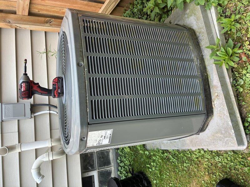 Completed BS-MVP cooling maintenance visit on 12-year-old air conditioning system. Upon inspection, discovered significant dust and debris accumulation on blower wheel assembly, with thick lint-like material coating the blades and restricting airflow efficiency. Cleaned blower wheel thoroughly to restore proper air circulation. Inspected outdoor condenser unit, which showed normal operating condition with adequate clearance from surrounding vegetation. Verified system functionality and confirmed unit is operating within normal parameters for continued service.