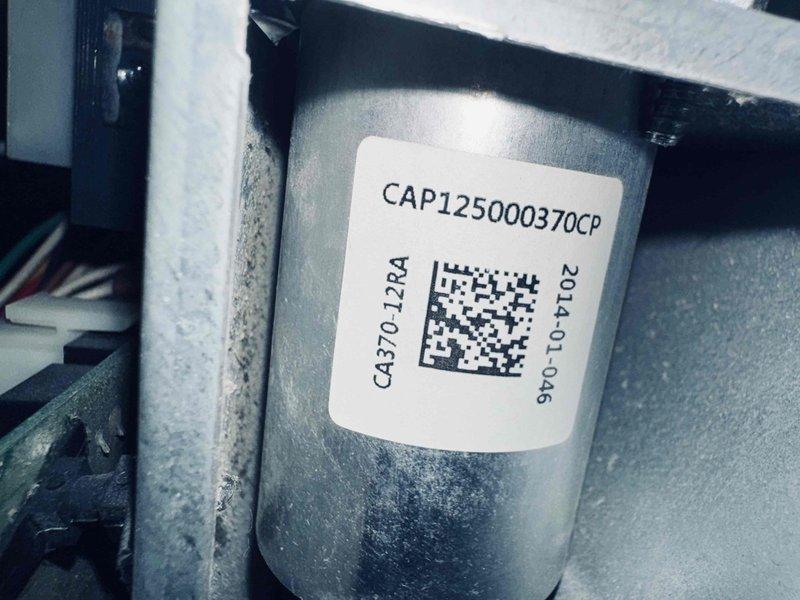 Performed complete air conditioning tune-up on 6-year-old Goodman system model CAP125000370CP. Conducted system diagnostics including temperature differential measurements and electrical testing, verified proper operation of all components, and documented equipment condition with photos for maintenance records.