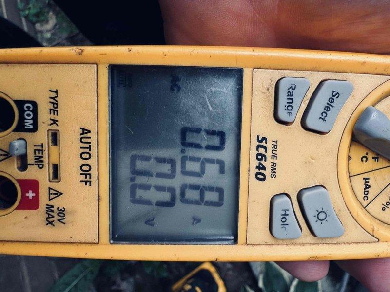 Performed complete air conditioning tune-up on 6-year-old Goodman system model CAP125000370CP. Conducted system diagnostics including temperature differential measurements and electrical testing, verified proper operation of all components, and documented equipment condition with photos for maintenance records.