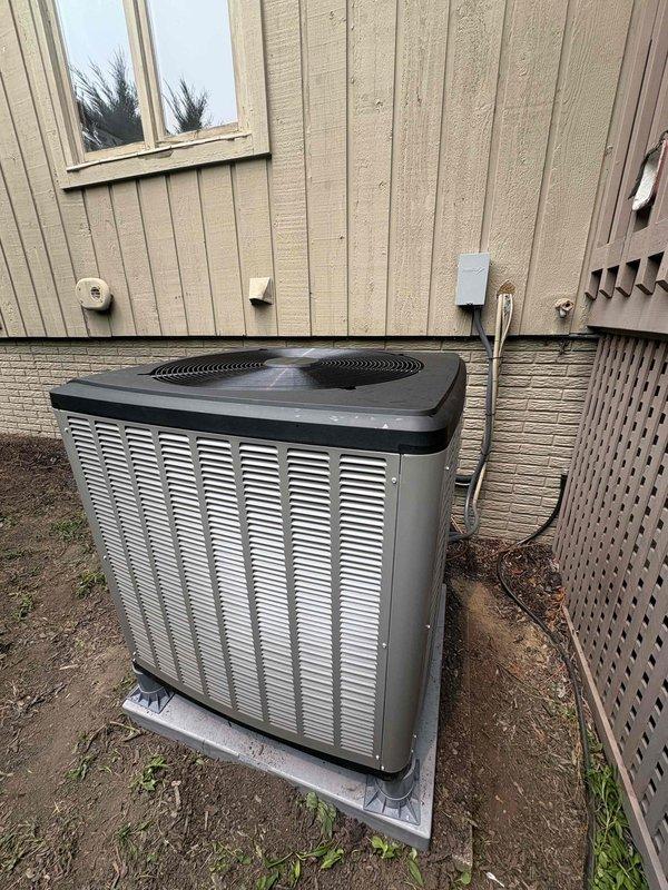 Replaced defective heat pump outdoor unit under manufacturer warranty. Removed existing outdoor condenser from concrete pad and disconnected refrigerant lines and electrical connections. Installed new replacement unit, reconnected copper refrigerant lines with proper brazing techniques, and restored electrical service through existing disconnect box. Verified indoor air handler connections remained secure and system communication was established between indoor and outdoor components. Performed startup procedures, checked refrigerant charge levels, and confirmed proper system operation with normal temperature differentials across the coil.
