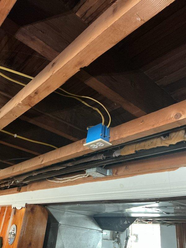 Replaced bedroom ceiling fan with customer-provided light fixture and installed wireless 3-way switch system to enable remote operation from nightstand. Replaced defective duplex outlet behind living room couch and troubleshot malfunctioning light fixture that remained illuminated after being switched off. Accessed attic space to run wiring for wireless switch installation and verified all electrical connections were secure and functioning properly.
