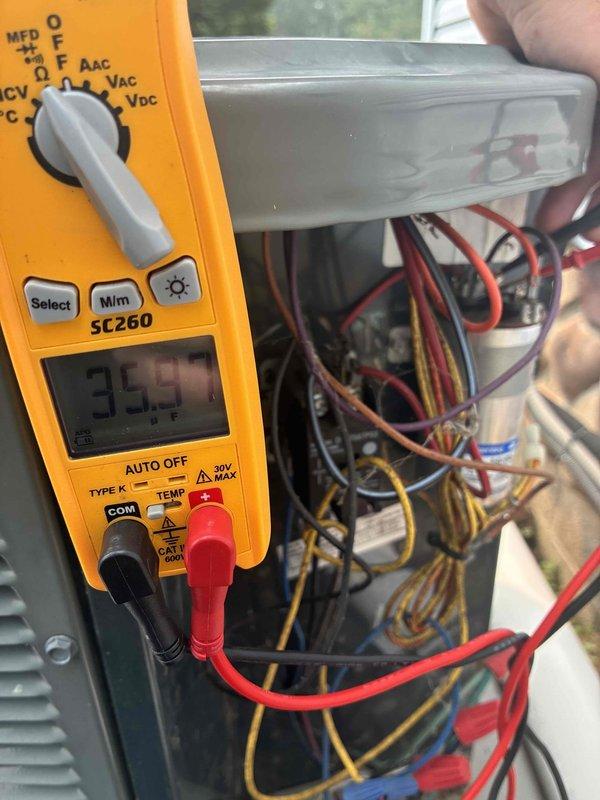 Performed comprehensive AC tune-up on outdoor condensing unit. Conducted electrical diagnostics using digital multimeter, measuring voltage and amperage at control board and verifying proper electrical connections throughout the system. Inspected wiring compartment, documented wire routing and connections, and confirmed all components operating within normal parameters.