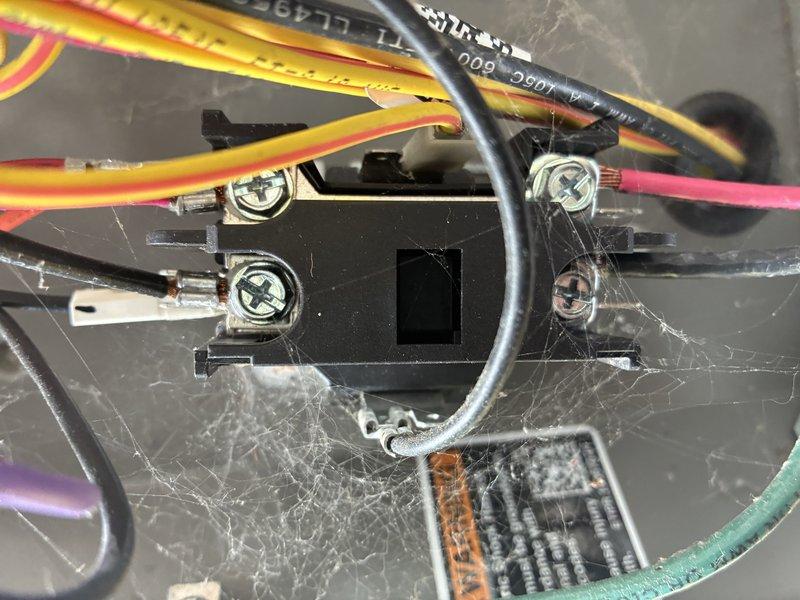 Responded to service call for filter replacement on HVAC system. Upon inspection, discovered significant dust and cobweb accumulation on electrical control board and system components, indicating extended period without maintenance. Replaced air filters, cleaned electrical connections and control board terminals to ensure proper system operation and prevent potential electrical issues from debris buildup. Verified all wire connections secure at terminal points and documented equipment serial number and manufacturer information for service records.
