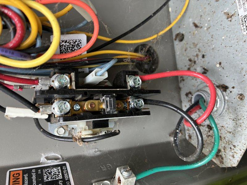 Responded to air conditioning service call for 3-year-old Lennox outdoor condenser unit. Upon arrival, performed comprehensive system inspection including visual examination of electrical connections, contactor assembly, and wiring terminals. Inspected condenser fan motor operation and verified proper electrical connections at terminal block. Checked refrigerant line connections and assessed overall unit condition. All electrical connections were secure, wiring showed proper configuration with appropriate color-coded conductors connected to terminals. Unit operational at time of inspection with no immediate failures detected.