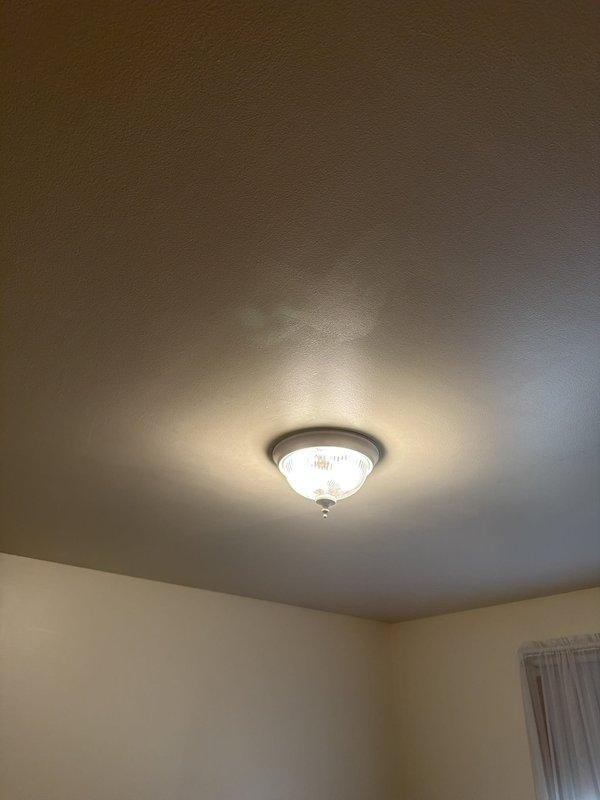 Responded to service call for flickering lights in residential property. Upon inspection, diagnosed and resolved electrical issue with ceiling-mounted light fixture. Verified proper operation of flush-mount fixture with frosted glass dome shade, ensuring stable illumination without flickering. Tested electrical connections and confirmed system functionality, restoring safe and reliable lighting operation.