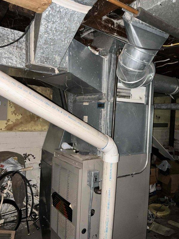 Completed comprehensive HVAC estimate for full system replacement of existing forced-air furnace and air conditioning equipment in residential basement installation. Evaluated current Dependable brand 92% efficiency furnace unit with existing ductwork configuration, assessed equipment condition and operational status, documented system specifications, and provided replacement recommendations for upgraded heating and cooling system with proper sizing calculations based on home requirements.