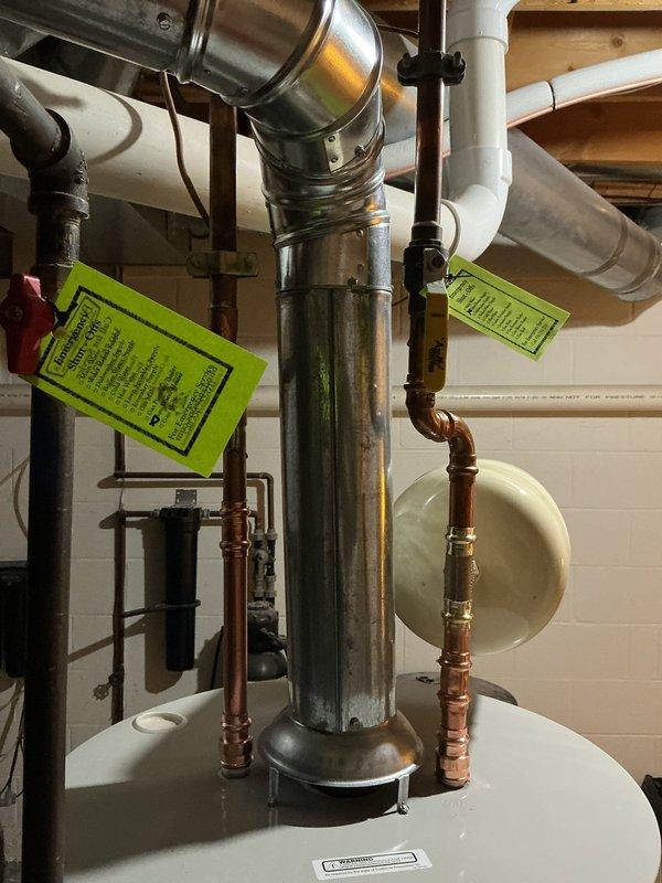 Installed a 2.1 gallon expansion tank on a 50-gallon water heater system with 3/4" connection. Parts were ordered and staged with the water heater kit prior to installation, then properly integrated into the existing plumbing system to provide thermal expansion protection and maintain system pressure stability.