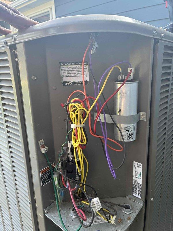 Completed recurring cooling and heating maintenance visit. Performed comprehensive system inspection including electrical components, capacitor evaluation, and insulation assessment. Documented equipment condition with photos showing proper insulation installation and electrical panel configuration with all wire connections secure and capacitor functioning within specifications.