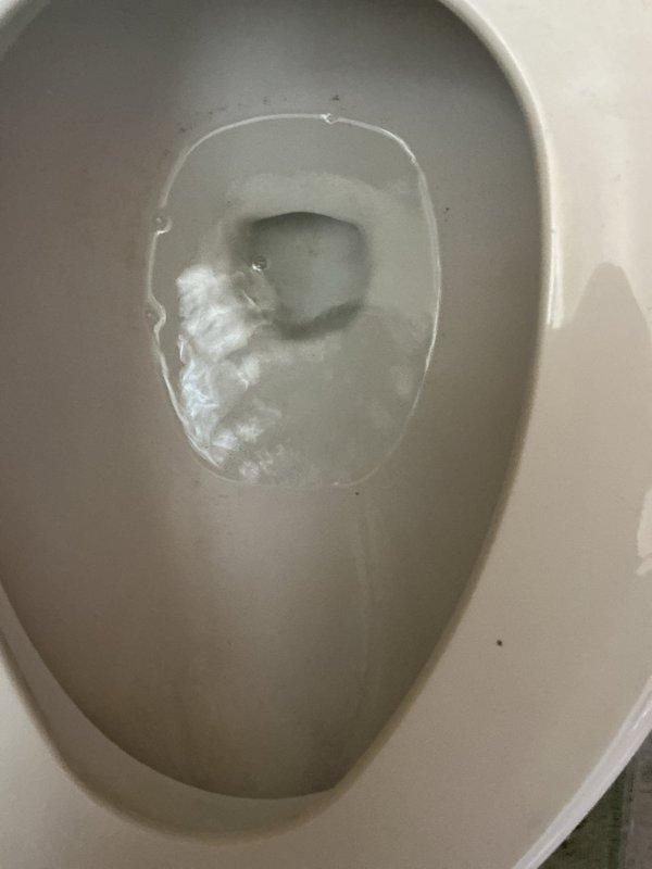 Responded to service call for continuously running toilet with constant water flow into bowl. Upon inspection, identified faulty fill valve causing water to drip non-stop into the bowl. Replaced defective fill valve assembly and adjusted water level to manufacturer specifications. Tested flush mechanism multiple times to ensure proper operation and verified complete shutoff with no residual water flow into bowl.