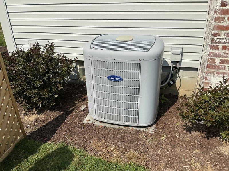 Conducted comprehensive estimate for complete HVAC system replacement including furnace and air conditioning equipment. Customer expressed interest in promotional offer for bundled furnace and AC installation after seeing advertised special. Documented existing Carrier brand outdoor condenser unit currently installed on concrete pad with proper landscaping clearance, evaluated electrical disconnect and refrigerant line routing, and assessed installation conditions to provide accurate replacement pricing and equipment recommendations.