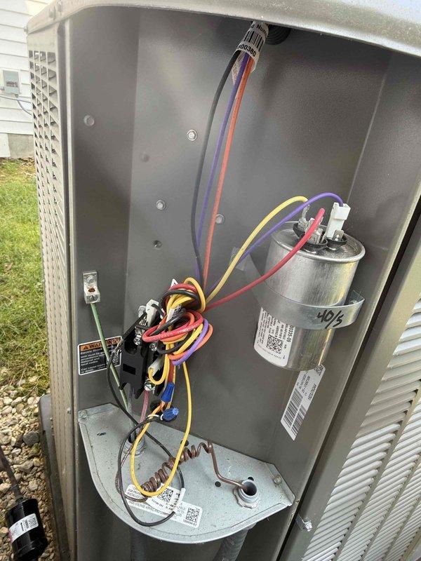 Completed MVP recurring cooling maintenance visit on residential HVAC system. Performed comprehensive system inspection including electrical components, capacitor condition, and control board functionality. Documented all DIP switch configurations on the control board for service records. Verified proper wire connections to capacitor and electrical components, confirmed all terminals secure with no signs of overheating or corrosion. System operating within normal parameters with no deficiencies noted.