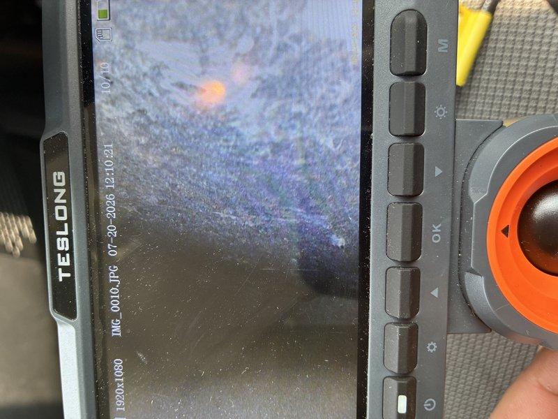 Performed comprehensive tune-up on air conditioning system over 10 years old. Conducted visual inspection of ductwork interior using borescope camera to assess condition and identify any blockages or deterioration, and measured electrical current draw with clamp meter to verify proper amperage and system performance.