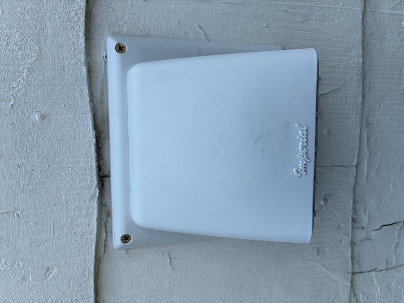 Replaced existing exhaust fan unit with customer-provided fan in pre-vented location. Installed new exterior vent cap to complete the ventilation system. Both interior grille and exterior junction box were properly secured to existing mounting surfaces, ensuring proper airflow and weather protection.