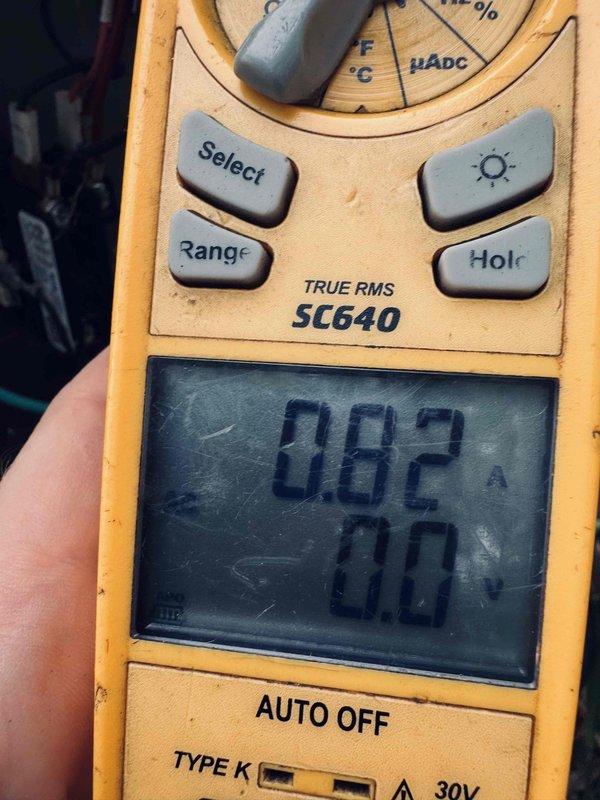 Performed comprehensive cooling system tune-up and preventative maintenance on properly functioning HVAC unit. Conducted electrical diagnostics using digital multimeter, measuring system amperage at 8.68A and verifying voltage readings to ensure equipment operating within manufacturer specifications. All components inspected and found to be functioning correctly with no issues identified.