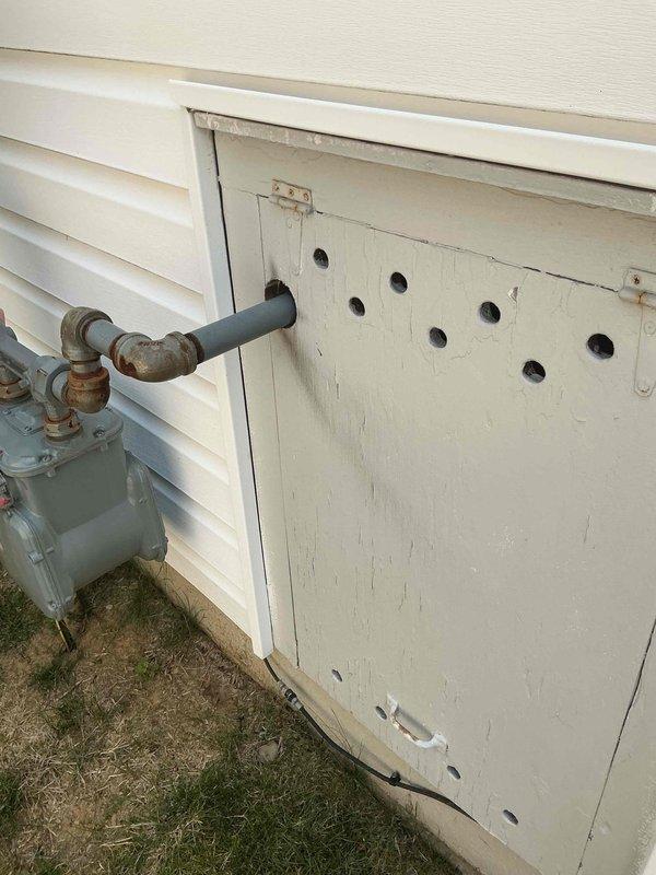 Conducted on-site electrical assessment for 14kW standby generator installation. Evaluated existing utility infrastructure including gas meter, piping connections, and electrical service panel location. Documented current conditions of exterior mounting area, gas line accessibility, and potential equipment placement zones. Assessed foundation clearances, drainage patterns, and utility routing requirements for proper generator installation per manufacturer specifications and local electrical codes.