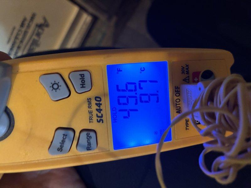 Responded to complaint of excessive noise and inadequate cooling on second floor following recent PCB installation. Upon inspection, discovered heavily contaminated return air filters with significant dust and debris accumulation, restricting airflow to the system. Verified system operation using digital multimeter to check electrical parameters and confirm proper component function. Identified clogged filters as primary cause of reduced cooling capacity and increased operational noise due to restricted airflow forcing system to work harder. Documented conditions with photos showing extent of filter contamination and diagnostic testing performed.