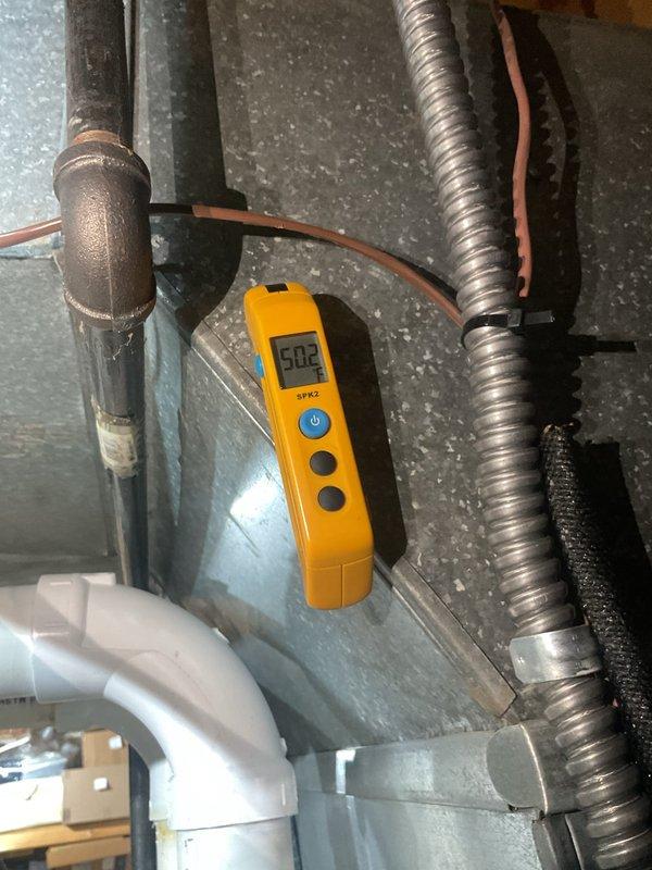 Completed MVP recurring cooling maintenance visit on residential HVAC system. Performed comprehensive system inspection including verification of refrigerant pressures, which measured at 502 PSI as documented. Inspected dual-run capacitor (CBB65A, 45+5 MFD, 440V) for proper operation and physical condition. Examined all refrigerant line connections, ductwork integrity, and condensate drainage components in attic mechanical space. All system components found operating within normal parameters with no immediate service needs identified.
