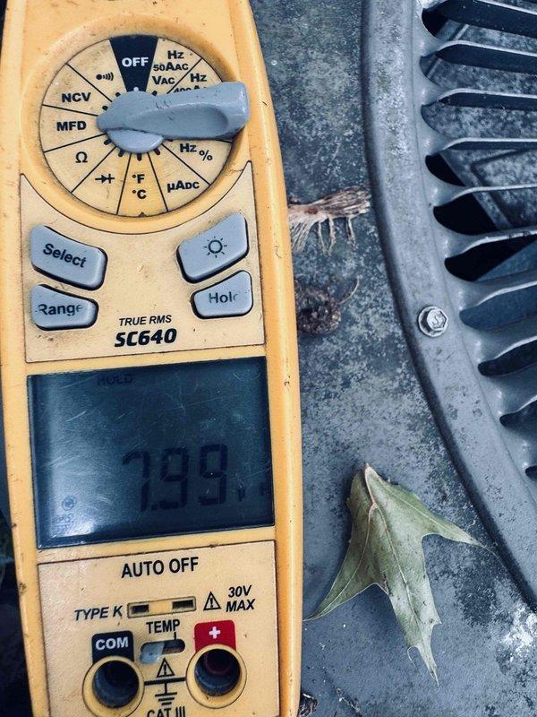 Responded to no cooling complaint and diagnosed failed capacitor using multimeter, which confirmed capacitor reading of 299 microfarads outside acceptable range. Replaced defective capacitor and restored proper system operation, with unit now providing adequate cold air circulation.