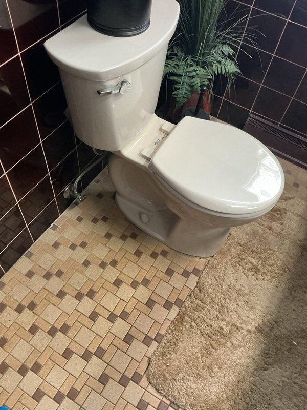Responded to emergency service call for non-functioning toilet. Upon inspection, found defective internal flush mechanism components including worn flapper valve and faulty flush valve assembly. Removed toilet tank lid, assessed condition of all internal components, and documented existing mineral deposits and component wear. Repaired toilet by replacing malfunctioning internal parts, restoring proper flushing operation and resolving the emergency issue.