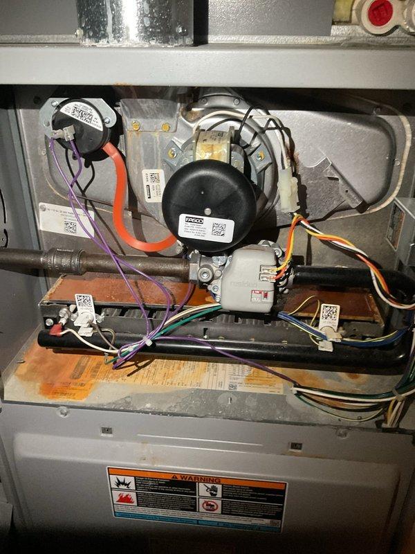 Completed comprehensive AC tune-up on outdoor condensing unit and associated components. Performed visual inspection of electrical connections, motor assembly, and refrigerant lines; all components found to be in operational condition with normal wear patterns. System tested and confirmed functioning properly upon completion.