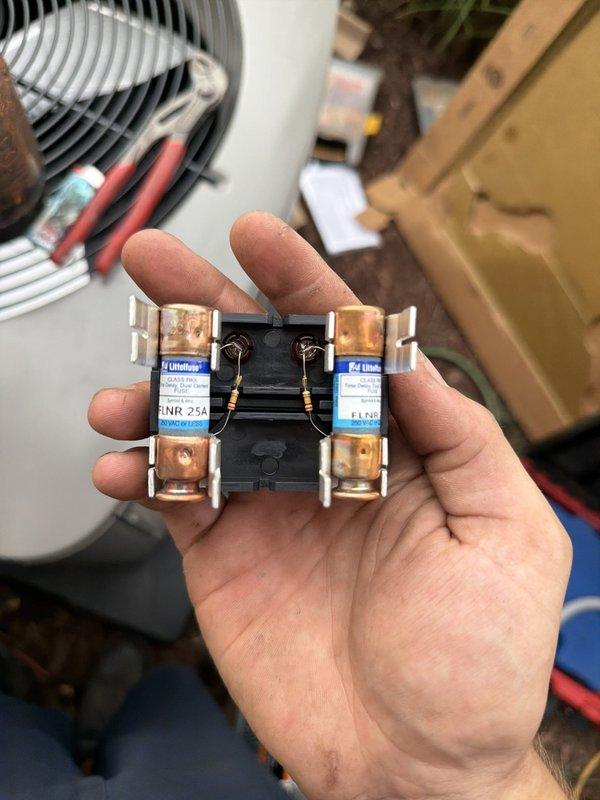 Completed second-phase installation work on residential air conditioning system by installing customer-supplied Nest thermostat. Verified outdoor condensing unit operation, confirmed proper electrical connections including fuse protection, and ensured all components were functioning correctly with new thermostat integration.