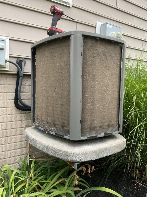Completed annual air conditioning tune-up on seven-year-old residential system with no reported issues. Performed comprehensive preventive maintenance including inspection of outdoor condensing unit, indoor air handler components, refrigerant levels, electrical connections, and system controls. All components found operating within normal parameters; cleaned condenser coils and verified proper system operation upon completion.