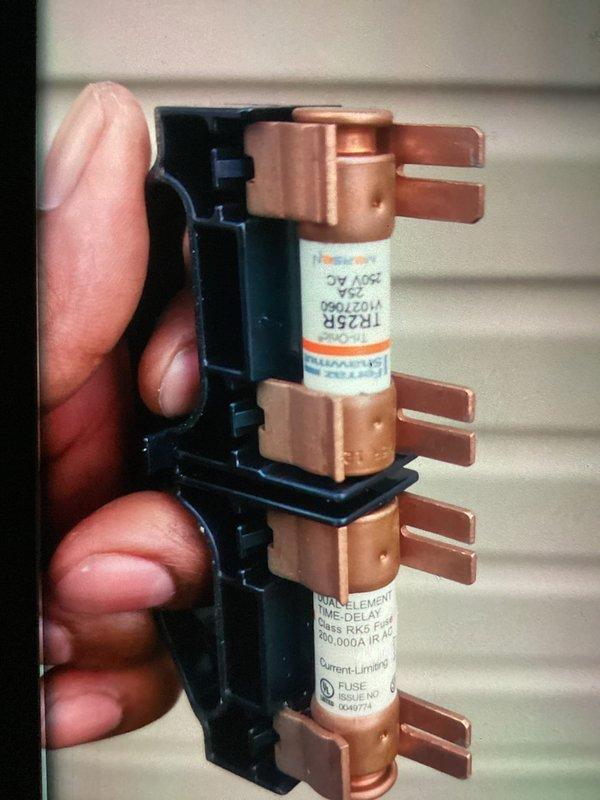 Completed preventive maintenance inspection on residential split-system air conditioning unit as part of recurring MVP cooling service. Performed comprehensive system evaluation including visual inspection of outdoor condenser unit, verification of proper installation on concrete pad, and assessment of electrical components. Inspected and tested TR25R fuses in disconnect box, confirming proper amperage rating and fuse integrity for overcurrent protection. Unit operating within normal parameters with no deficiencies noted at time of service.