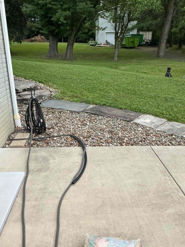 Completed comprehensive electrical estimate for whole home generator installation at residential property. Assessed existing electrical service panel, meter location, and optimal generator placement on concrete patio area adjacent to house foundation. Documented current electrical infrastructure including meter box, junction boxes, and conduit routing along exterior wall to determine connection requirements and necessary materials for generator integration into home electrical system.